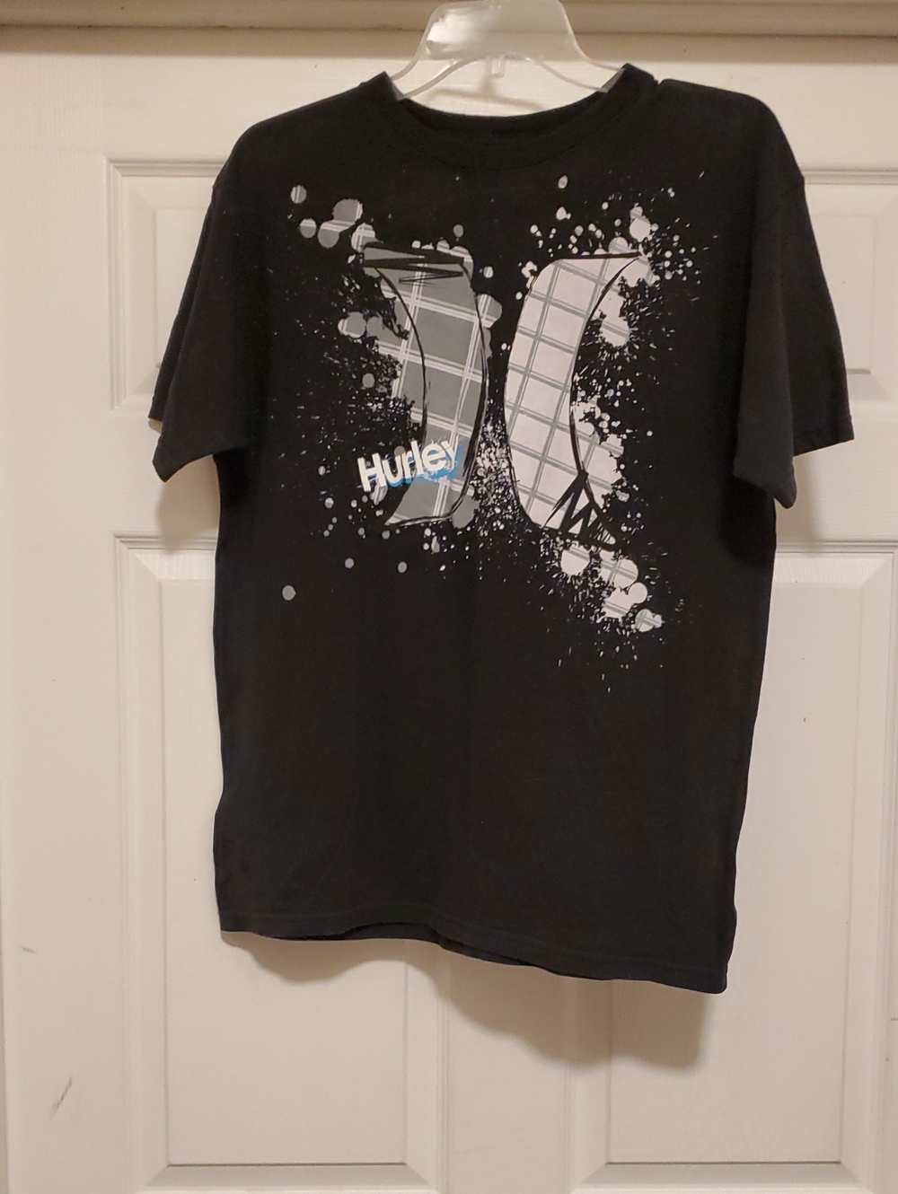 Hurley Black Tee with Plaid Logo and Paint-Splash Graphic
